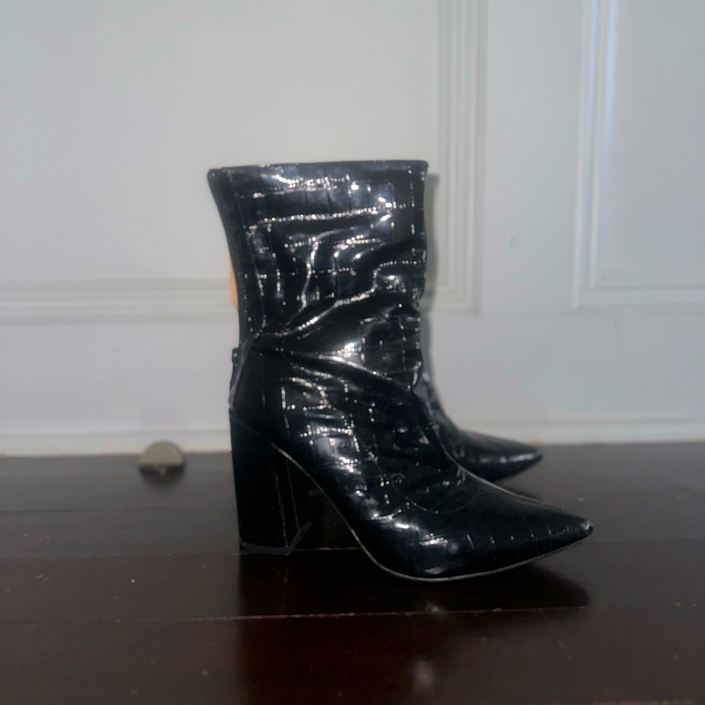 Black leather heeled booties